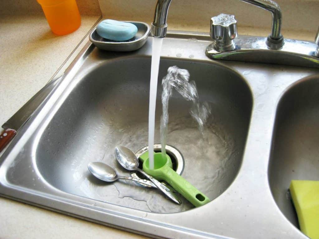 Be Renovative - kitchen sink flowing water, helping to make house / apartment renovation simple, practical and fun